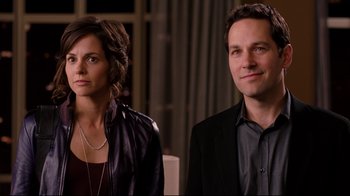 Movie still from “Dinner for Schmucks” (2010), directed by Jay Roach – A man and a woman standing next to each other; Close Up shot, Over the shoulder angle