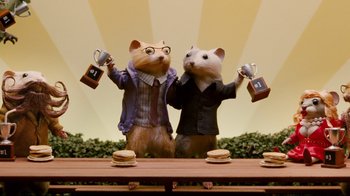 Movie still from “Dinner for Schmucks” (2010), directed by Jay Roach – Two hamsters dressed up like a couple of people holding drinks; Medium shot, Low angle
