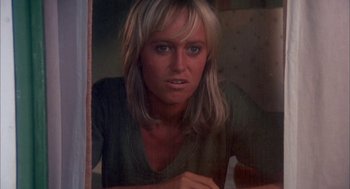 Movie still from “Dirty Mary Crazy Larry” (1974), directed by John Hough – A woman with blonde hair looking into a mirror; Close Up shot, Low angle