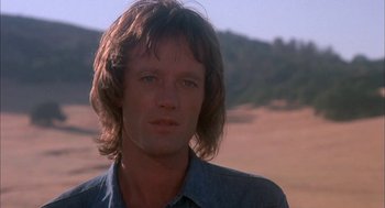 Movie still from “Dirty Mary Crazy Larry” (1974), directed by John Hough – A person with long hair; Close Up shot, Low angle