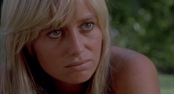 Movie still from “Dirty Mary Crazy Larry” (1974), directed by John Hough – A person with long hair; Close Up shot, Low angle