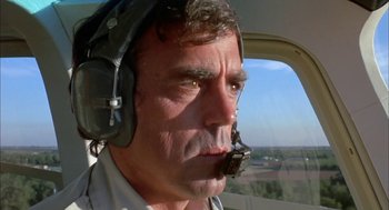 Movie still from “Dirty Mary Crazy Larry” (1974), directed by John Hough – A person in a helicopter; Close Up shot, Low angle