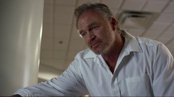 Movie still from “Do You Believe?” (2015), directed by Jon Gunn – A person wearing a white shirt; Close Up shot, Low angle