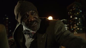 Movie still from “Do You Believe?” (2015), directed by Jon Gunn – An older man wearing a hat and a bow tie; Close Up shot, Low angle