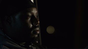 Movie still from “Do You Believe?” (2015), directed by Jon Gunn – A person with a beard; Close Up shot, Over the shoulder angle