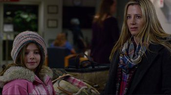 Movie still from “Do You Believe?” (2015), directed by Jon Gunn – Two young women standing next to each other in a room; Close Up shot, Over the shoulder angle