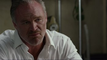 Movie still from “Do You Believe?” (2015), directed by Jon Gunn – A person wearing a white shirt; Close Up shot, Low angle