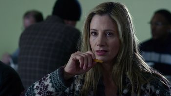 Movie still from “Do You Believe?” (2015), directed by Jon Gunn – A woman is holding a pencil in her hand; Close Up shot, Over the shoulder angle