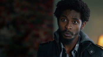 Movie still from “Do You Believe?” (2015), directed by Jon Gunn – A person with a beard; Close Up shot, Over the shoulder angle