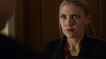 Movie still from “Do You Believe?” (2015), directed by Jon Gunn – A blonde woman with red lipstick looking at the camera; Close Up shot, Over the shoulder angle
