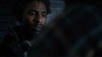 Movie still from “Do You Believe?” (2015), directed by Jon Gunn – A person looking at a camera; Close Up shot, Over the shoulder angle