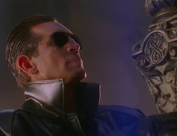 Movie still from “Doctor Who: The Movie” (1996), directed by Geoffrey Sax – A person wearing sunglasses; Close Up shot, Low angle