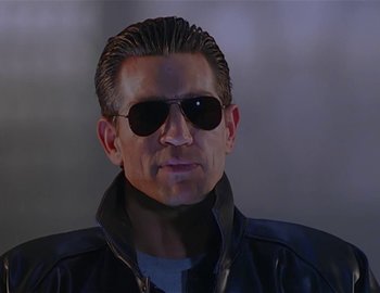 Movie still from “Doctor Who: The Movie” (1996), directed by Geoffrey Sax – A man wearing sunglasses and a leather jacket; Close Up shot, Low angle