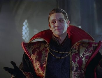 Movie still from “Doctor Who: The Movie” (1996), directed by Geoffrey Sax – A person wearing a costume; Medium shot, Low angle