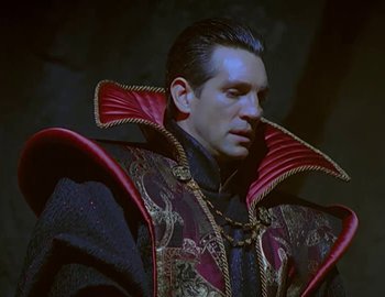 Movie still from “Doctor Who: The Movie” (1996), directed by Geoffrey Sax – A person wearing a costume; Medium shot, Low angle