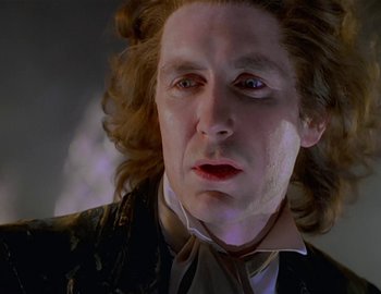 Movie still from “Doctor Who: The Movie” (1996), directed by Geoffrey Sax – A person with long hair; Close Up shot, Low angle