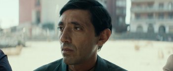 Movie still from “Dogman” (2018), directed by Matteo Garrone – A person looking at the camera; Close Up shot, Low angle