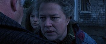 Movie still from “Dolores Claiborne” (1995), directed by Taylor Hackford – A person wearing a sweater; Close Up shot, Over the shoulder angle
