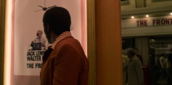 Movie still from “Dolemite Is My Name” (2019), directed by Craig Brewer – A person standing in front of a mirror; Medium shot, Over the shoulder angle