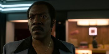 Movie still from “Dolemite Is My Name” (2019), directed by Craig Brewer – A person wearing a jacket; Close Up shot, Low angle
