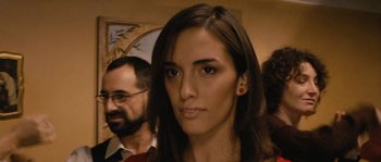 Movie still from “Don't Look Back” (2009), directed by Marina de Van – A person with long brown hair; Close Up shot, Over the shoulder angle