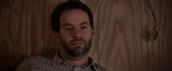 Movie still from “Don't Think Twice” (2016), directed by Mike Birbiglia – A person with a beard; Close Up shot, Low angle