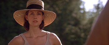 Movie still from “Double Jeopardy” (1999), directed by Bruce Beresford – A person wearing a sun hat; Close Up shot, Low angle