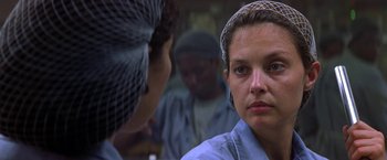 Movie still from “Double Jeopardy” (1999), directed by Bruce Beresford – A woman in a blue shirt is looking at another woman; Close Up shot, Over the shoulder angle