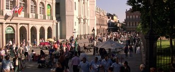 Movie still from “Double Jeopardy” (1999), directed by Bruce Beresford – A crowd of people walking down a street; Extreme Wide shot, High angle