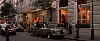 Movie still from “Double Jeopardy” (1999), directed by Bruce Beresford – A silver car parked on the side of the street; Wide shot, Low angle