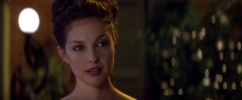 Movie still from “Double Jeopardy” (1999), directed by Bruce Beresford – A woman's face in the dark; Close Up shot, Over the shoulder angle