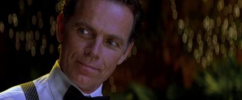 Movie still from “Double Jeopardy” (1999), directed by Bruce Beresford – A person wearing a tuxedo; Close Up shot, Over the shoulder angle