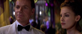 Movie still from “Double Jeopardy” (1999), directed by Bruce Beresford – A person wearing a bow tie; Close Up shot, Low angle