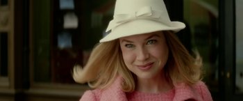 Movie still from “Down with Love” (2003), directed by Peyton Reed – A person wearing a white hat; Close Up shot, Low angle