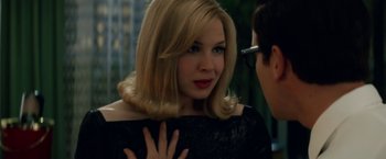 Movie still from “Down with Love” (2003), directed by Peyton Reed – A woman with blonde hair and red lipstick talking to a man; Close Up shot, Over the shoulder angle