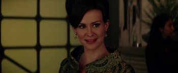 Movie still from “Down with Love” (2003), directed by Peyton Reed – A person wearing a dress; Close Up shot, Over the shoulder angle