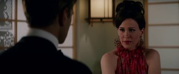 Movie still from “Down with Love” (2003), directed by Peyton Reed – A man and a woman in formal wear looking at one another; Close Up shot, Over the shoulder angle