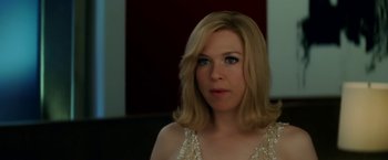 Movie still from “Down with Love” (2003), directed by Peyton Reed – A woman with blonde hair wearing a white dress; Close Up shot, Over the shoulder angle