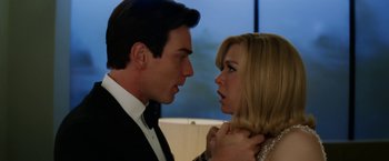 Movie still from “Down with Love” (2003), directed by Peyton Reed – A man and a woman are looking at one another; Close Up shot, Over the shoulder angle