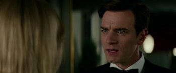 Movie still from “Down with Love” (2003), directed by Peyton Reed – A person looking at another person; Close Up shot, Over the shoulder angle
