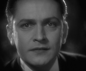 Movie still from “Dr. Jekyll and Mr. Hyde” (1931), directed by Rouben Mamoulian – A black - and - white photo of a man's face; Close Up shot, Low angle