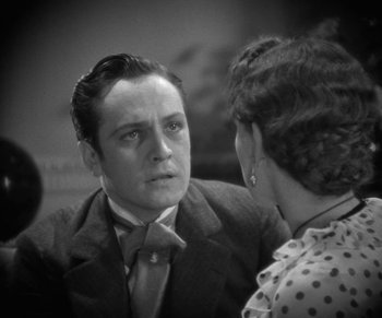 Movie still from “Dr. Jekyll and Mr. Hyde” (1931), directed by Rouben Mamoulian – A man and a woman talking to each other; Close Up shot, Over the shoulder angle