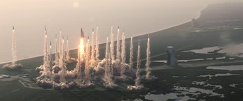 Movie still from “Don't Look Up” (2021), directed by Adam McKay – A group of rockets are flying through the air; Extreme Wide shot, Low angle