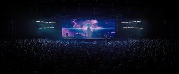 Movie still from “Don't Look Up” (2021), directed by Adam McKay – A crowd of people watching a large screen; Extreme Wide shot, Low angle