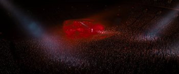 Movie still from “Don't Look Up” (2021), directed by Adam McKay – A large crowd of people in a dark room; Extreme Wide shot, High angle