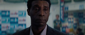 Movie still from “Don't Look Up” (2021), directed by Adam McKay – A person wearing a suit and tie; Close Up shot, Over the shoulder angle
