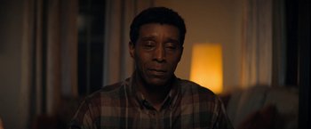 Movie still from “Don't Look Up” (2021), directed by Adam McKay – A person with his eyes closed; Close Up shot, Over the shoulder angle