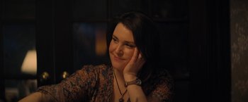 Movie still from “Don't Look Up” (2021), directed by Adam McKay – A woman sitting in front of a window with her hand on her face; Close Up shot, Over the shoulder angle