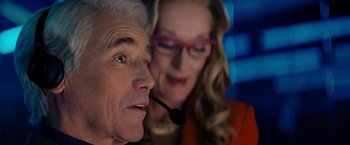 Movie still from “Don't Look Up” (2021), directed by Adam McKay – An older man and a younger woman are talking; Close Up shot, Low angle