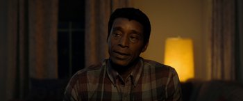 Movie still from “Don't Look Up” (2021), directed by Adam McKay – A person wearing a plaid shirt; Close Up shot, Over the shoulder angle